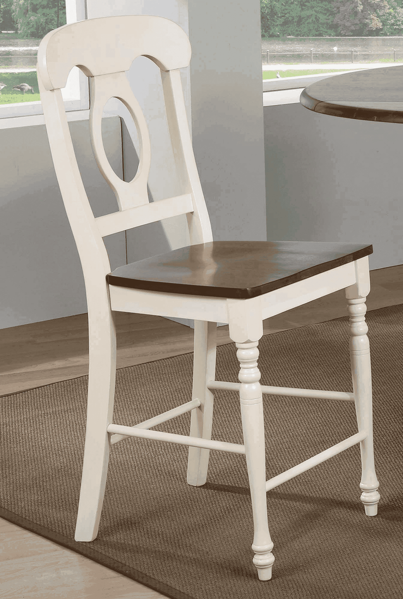 Cream wooden dining chair with a brown wood seat and classic design, featuring a carved oval backrest and turned legs.