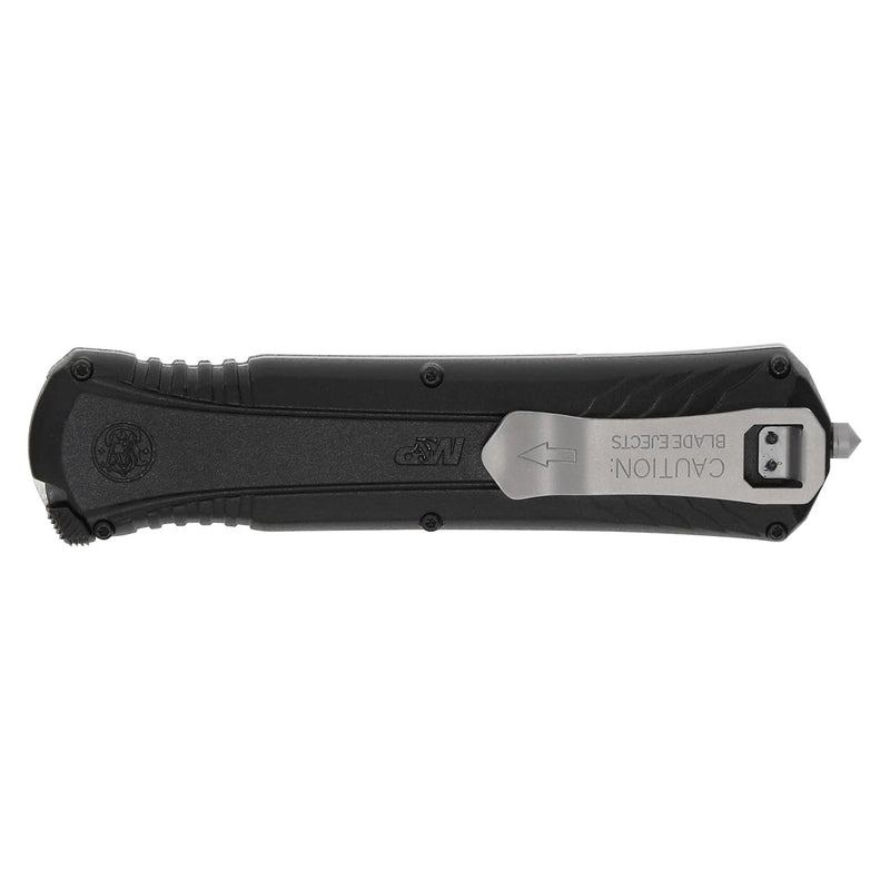 OTF pocket knife with black handle, blade release button, and partially extended gray blade