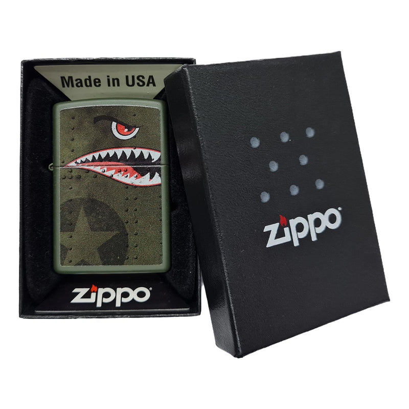 Matte green Zippo windproof lighter in box, with shark teeth art and Zippo logo