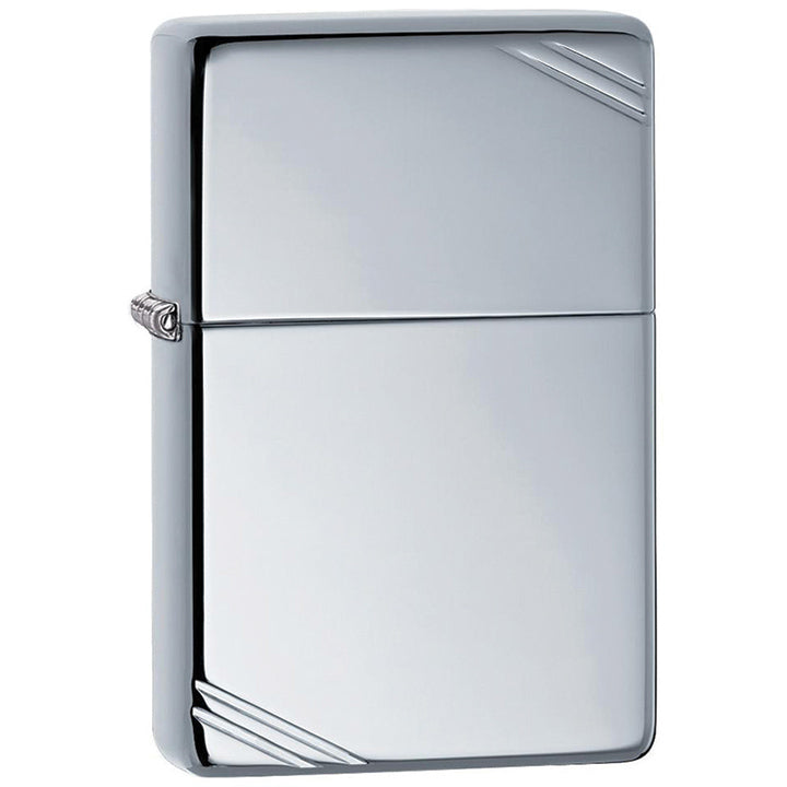 Silver-tone Zippo windproof lighter with slashed side accents, cover closed