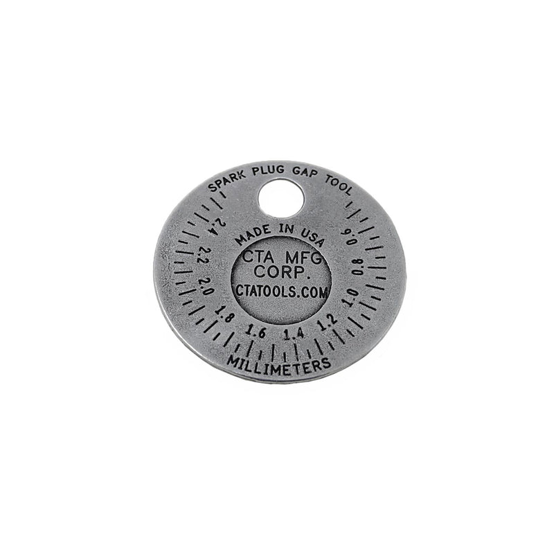 Spark plug gapper tool dial back with millimeters scale and CTA MFG CORP text