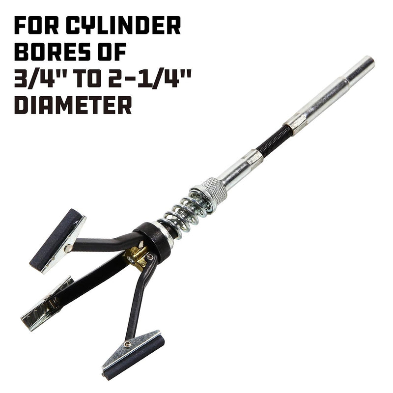 Cylinder bore honing tool with spring mechanism and cross-handle stone arms