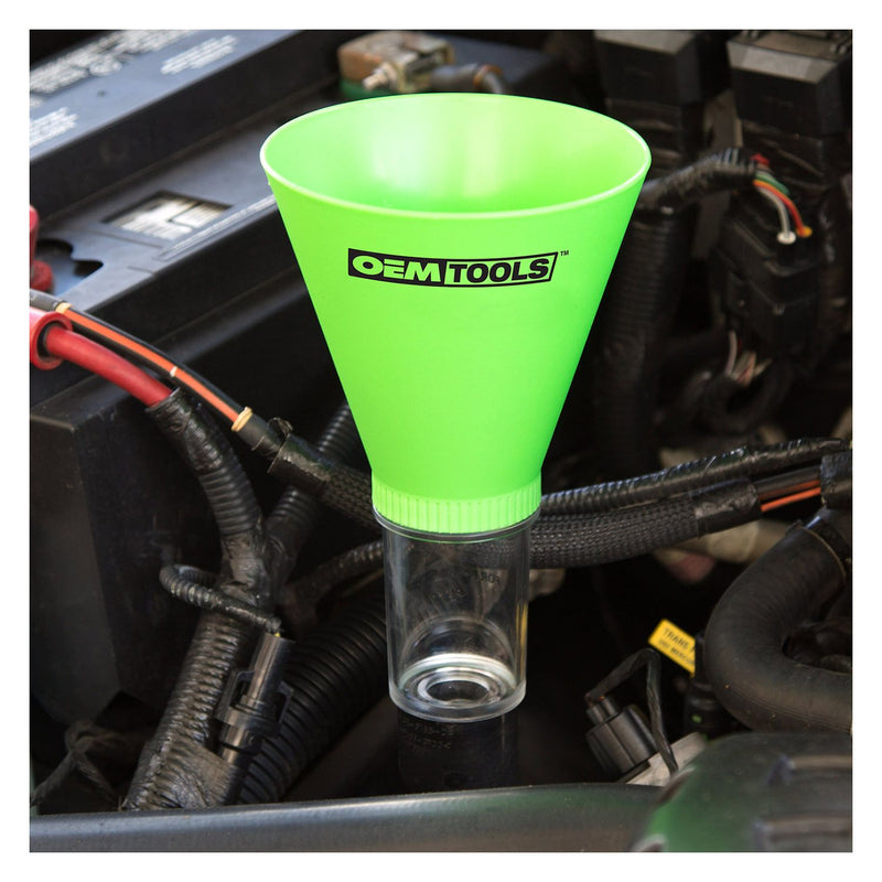 Green OEMTOOLS oil funnel installed in engine bay with clear neck and metal inlet