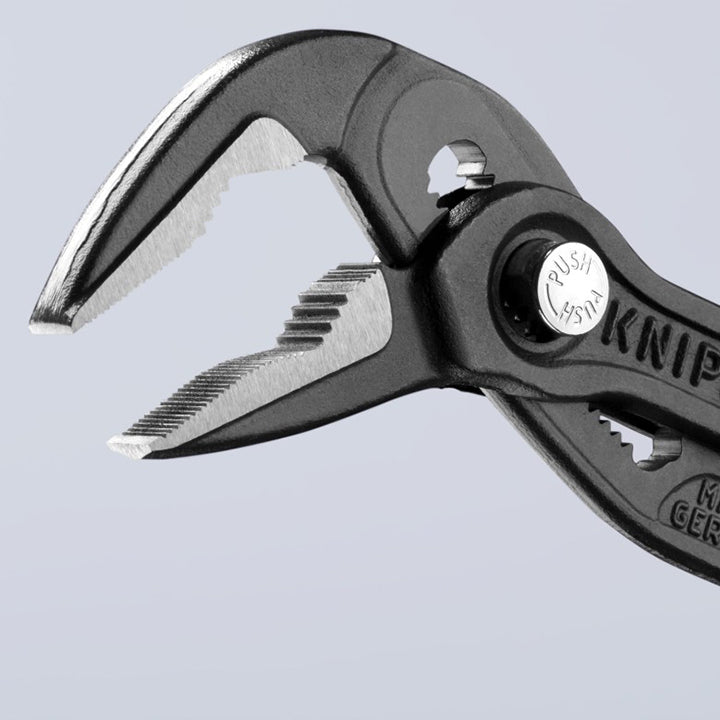 Water pump pliers head close-up with serrated adjustable jaws and Knipex branding