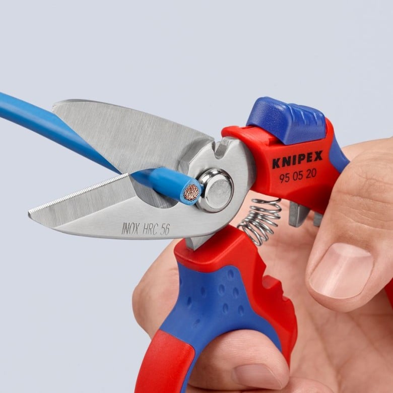 Knipex angled electricians' shears cutting blades, red/blue grips in hand