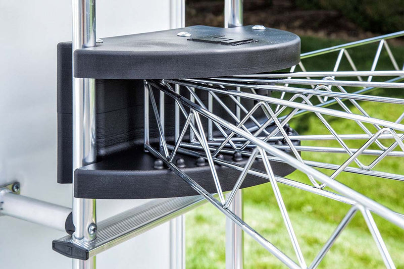 Black ladder-mount clothes dryer housing with hinged wire drying rack and arms