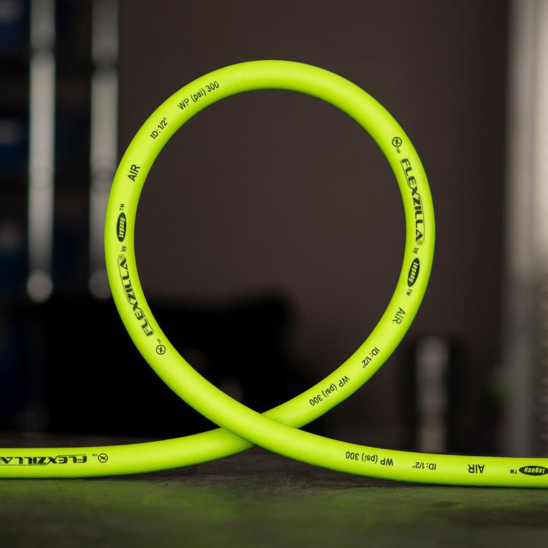 Green whip hose loop with printed sizing marks and black ribbed cover section