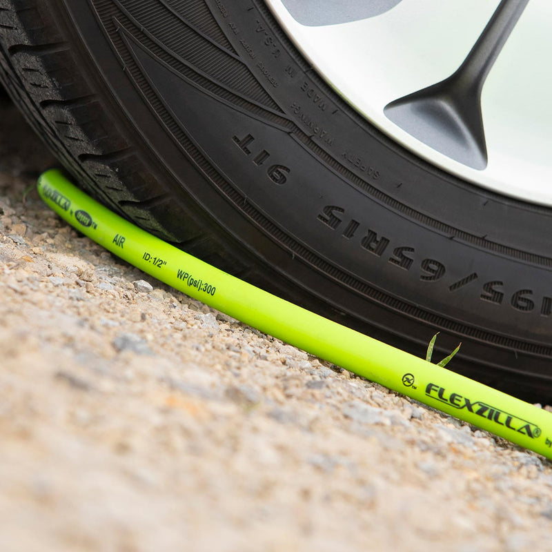 Green whip hose with black ribbed cover and printed markings along the length
