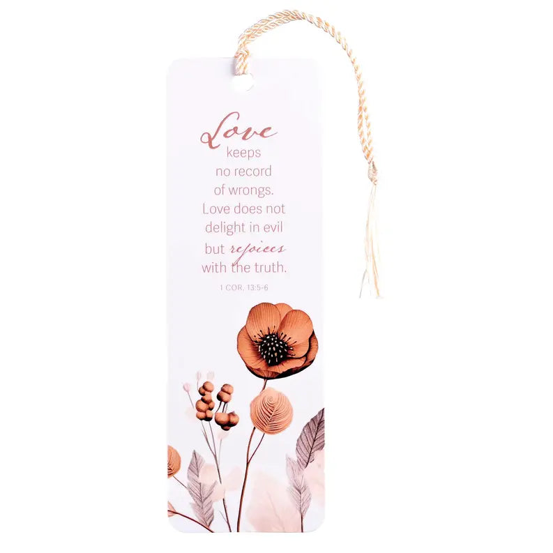 Floral bookmark with blush pink flowers, inspirational quote, and beige tassel; made of durable cardstock.