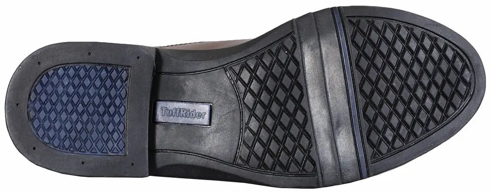 Black rubber shoe sole with textured grip pattern, designed for durability and traction, ideal for casual wear.