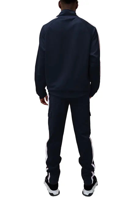 Men's navy blue tracksuit with white side stripes, featuring a zip-up jacket and cargo pants, made of soft polyester.