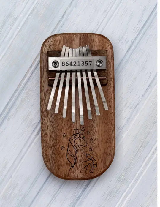 Unicorn Engraved Thumb Piano Mountain Melodies