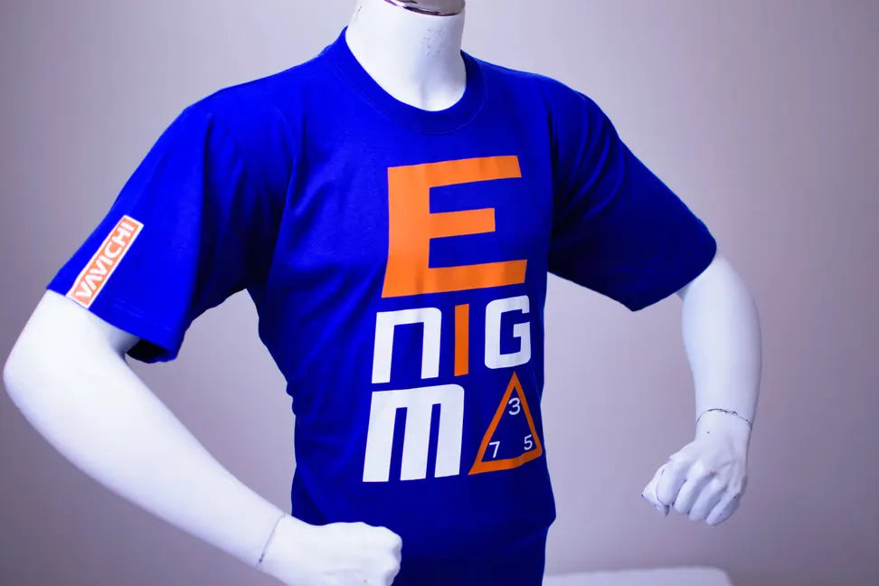 Blue cotton t-shirt with bold orange and white 'ENIGMA 315' graphic, casual style for men.