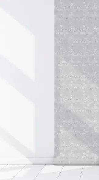 Light grey patterned wallpaper with a modern design, ideal for contemporary home decor.