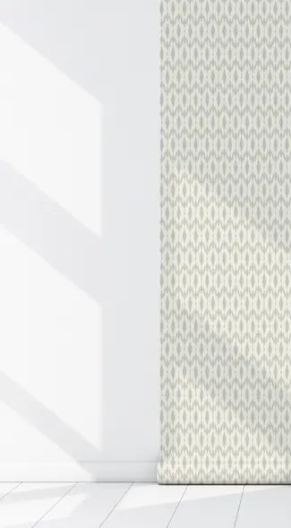 Light beige patterned fabric wallpaper with a modern geometric design against a white wall. Perfect for contemporary interiors.