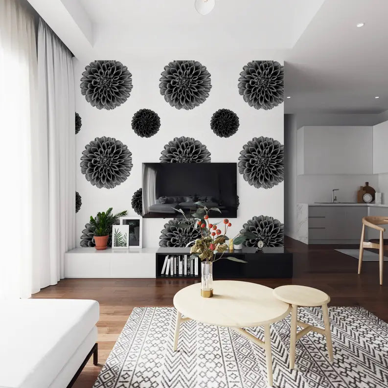 Black floral wallpaper design on a white background, paired with modern furniture in a stylish living room.