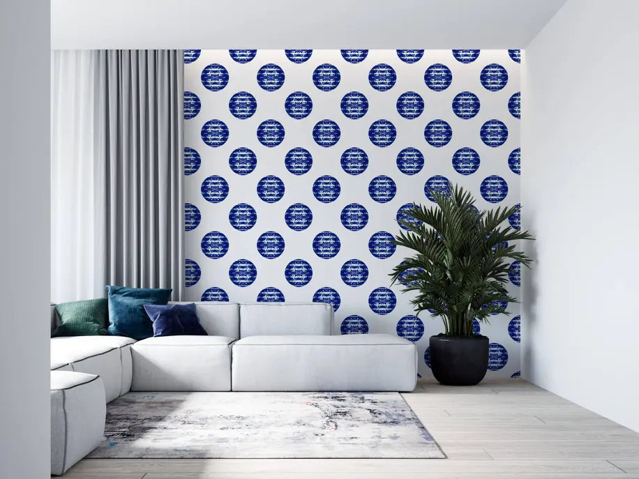 Modern wallpaper featuring blue circular patterns on a white background, enhancing a stylish living room with light gray furniture.