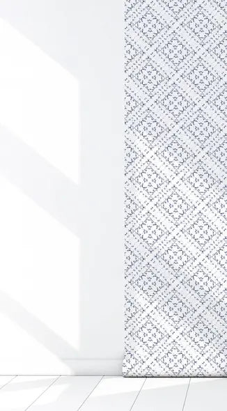 Blue and white geometric patterned textile on a light background, ideal for modern home decor.