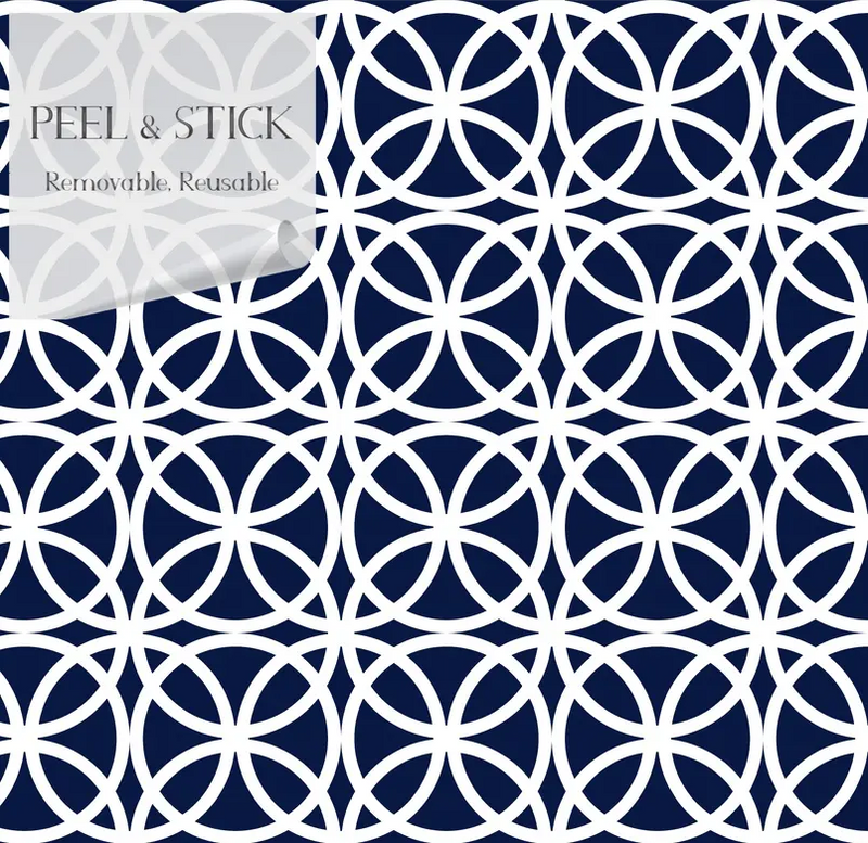 Navy blue peel and stick wallpaper with a white geometric circle pattern, removable and reusable for easy decor updates.