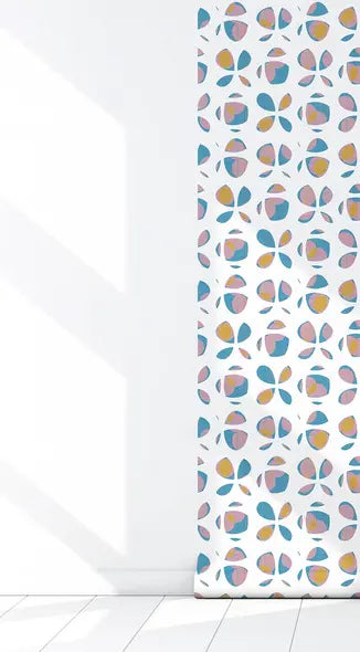 Colorful geometric pattern wallpaper in pastel pink, blue, and yellow on a white background for modern decor.