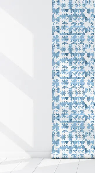 Blue and white geometric patterned wallpaper in a modern style, perfect for contemporary interiors.