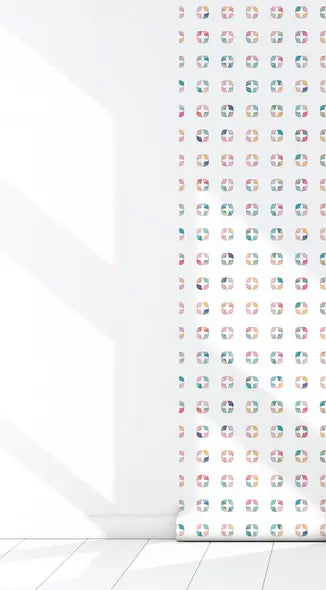 Colorful geometric patterned fabric roller shade on a white wall, perfect for modern home decor.