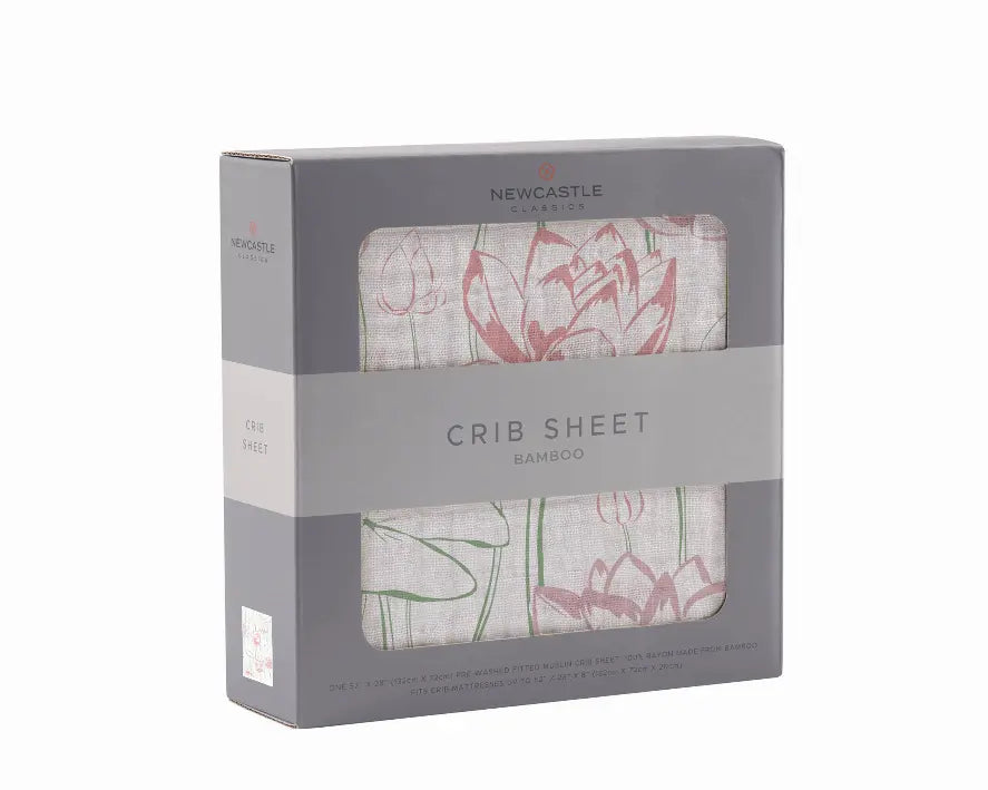 Floral pink and beige bamboo crib sheet in a stylish box by Newcastle Classics. Ideal for nursery decor.