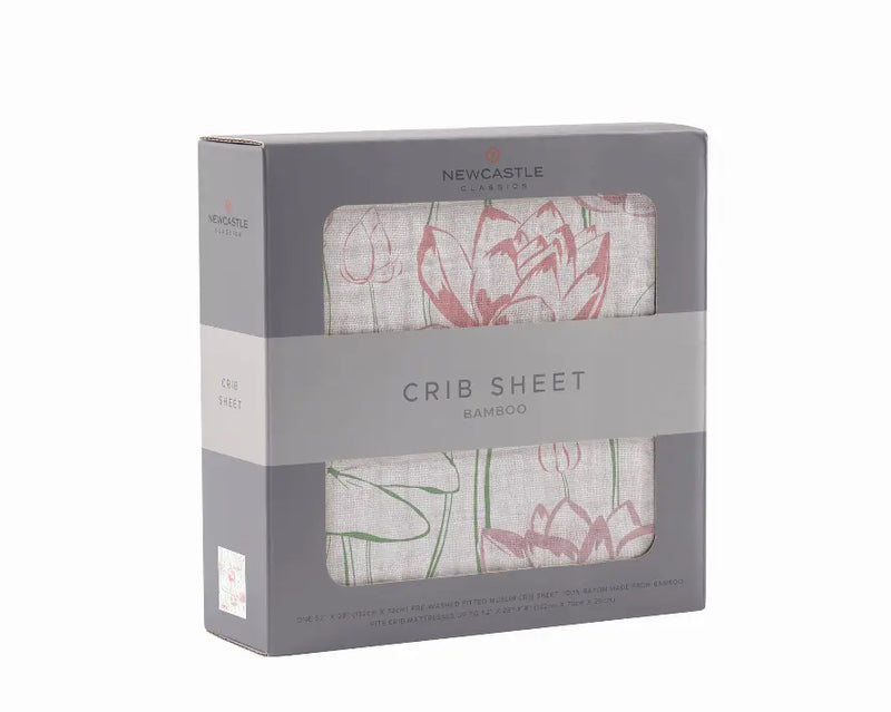 Floral pink and beige bamboo crib sheet in a stylish box by Newcastle Classics. Ideal for nursery decor.