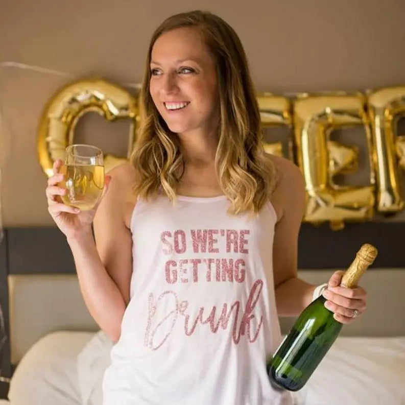 We're Getting Drunk Bridal Tank Top Dream Team Designs