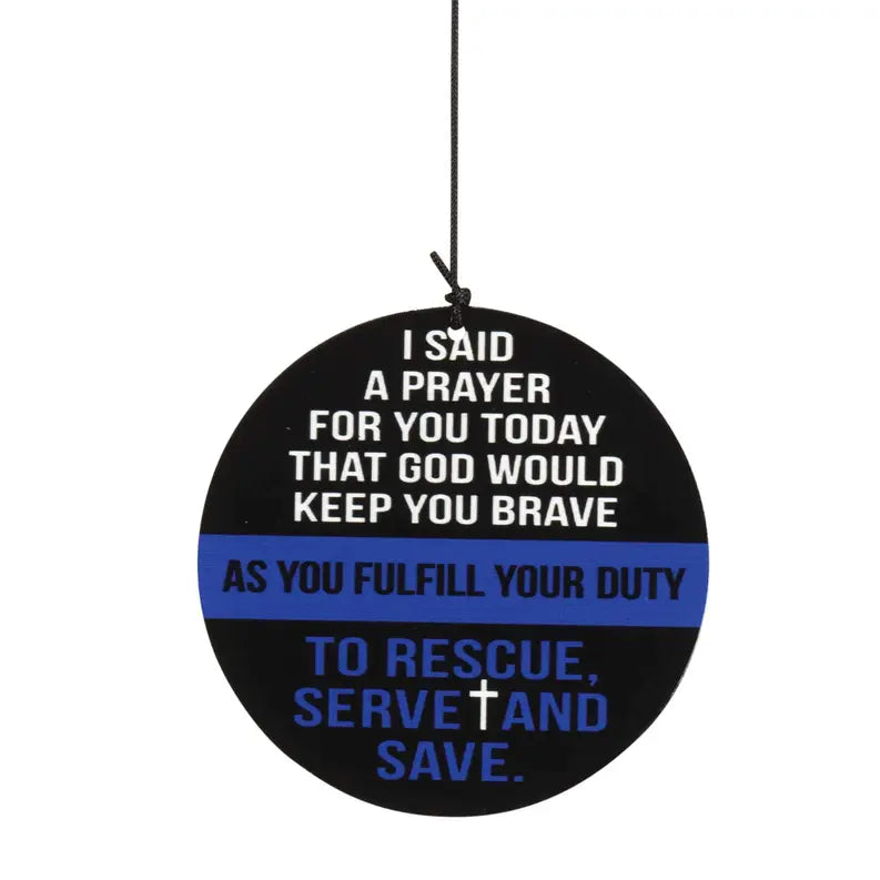 Black circular prayer ornament with blue stripe, features inspirational text and cross symbol, ideal for first responders.