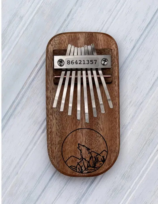 Wolf Engraved Thumb Piano Mountain Melodies