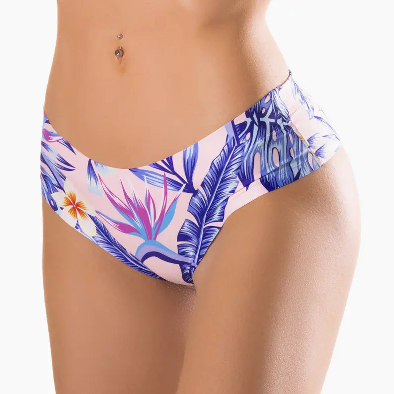 Tropical print bikini bottom in pastel pink, featuring blue leaves and vibrant flowers, made from high-quality swim fabric.