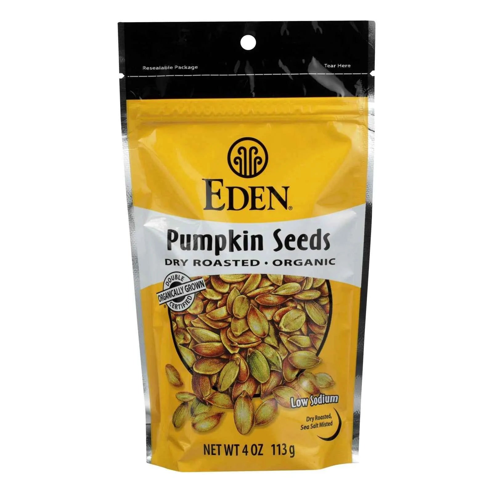 Eden Organic Dry Roasted Pumpkin Seeds, low sodium, 4 oz, packaged in a vibrant yellow resealable bag.